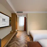 Qiuguo Hutong Courtyard Hotel