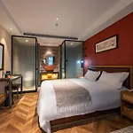 Qiuguo Hutong Courtyard Hotel
