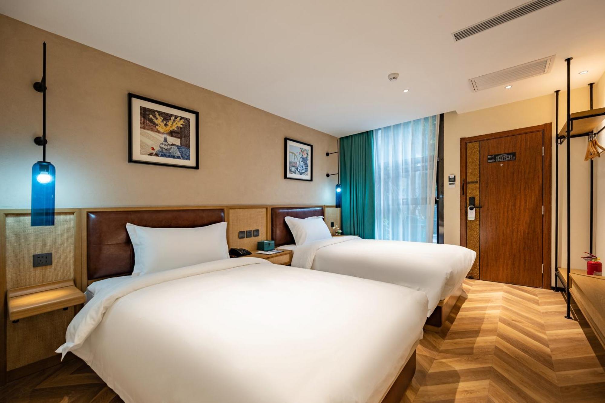 Qiuguo Hutong Courtyard Hotel 3*